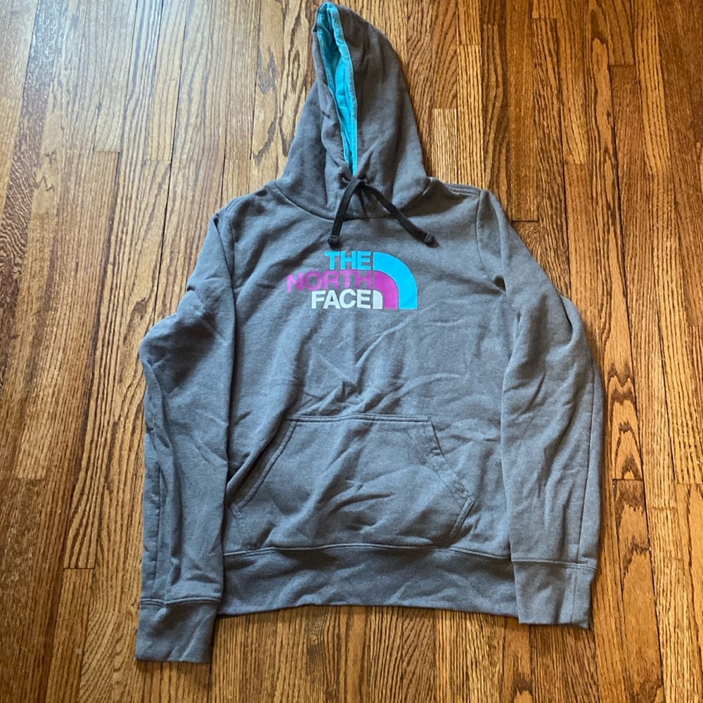 Size medium North Face hooded sweatshirt.